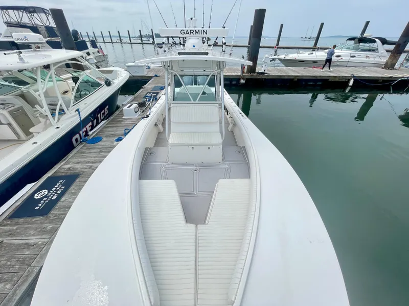 Slide: The Image of 2006 Regulator 32FS boat with Helm Master Joystick, docked at marina. - 15