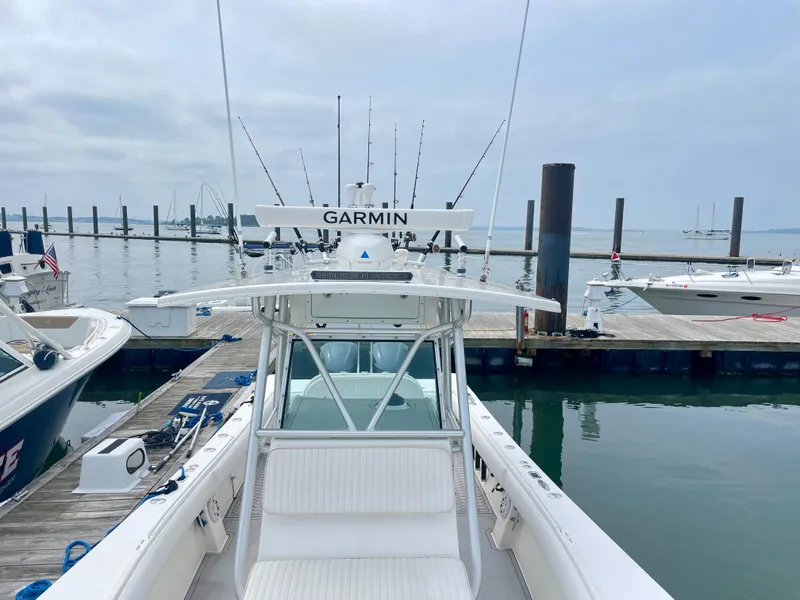Slide: The Image of Regulator 32FS boat with Garmin equipment docked at marina, 2006 model. - 16