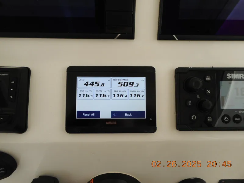 Slide: The Image of Yamaha display on 2024 NorthCoast 255HT boat dashboard, showing engine metrics. - 28