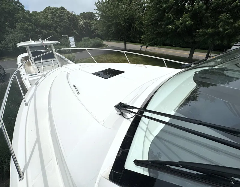 Slide: The Image of 2025 Pursuit OS 355 Offshore boat with sleek design and spacious deck. - 31