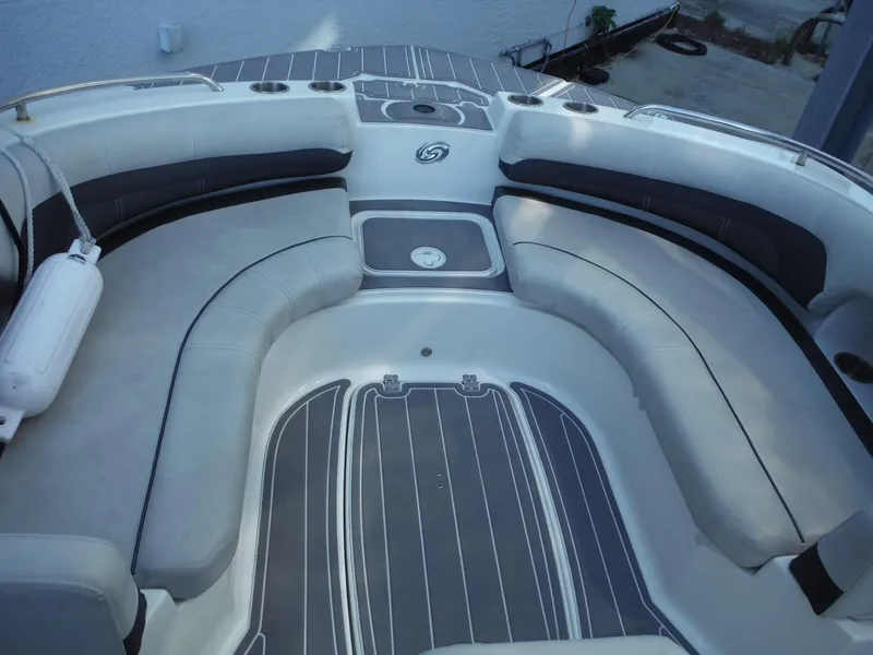 Slide: The Image of 2019 Hurricane Center Console 21 OB boat interior with cushioned seating and sleek design. - 12