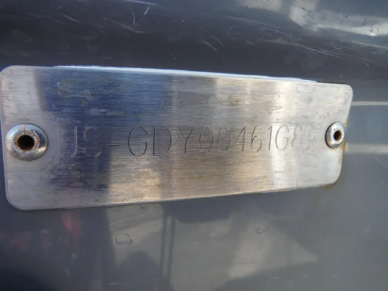 Slide: The Image of Metal identification plate on 2019 Hurricane Center Console 21 OB boat. - 21