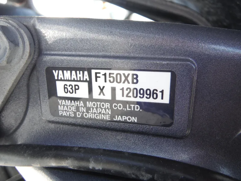 Slide: The Image of Yamaha F150XB engine label on 2019 Hurricane Center Console 21 OB boat. - 22
