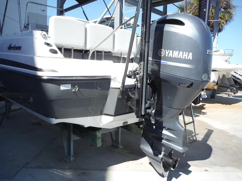 Slide: The Image of 2019 Hurricane Center Console 21 OB boat with Yamaha 150 outboard motor. - 23