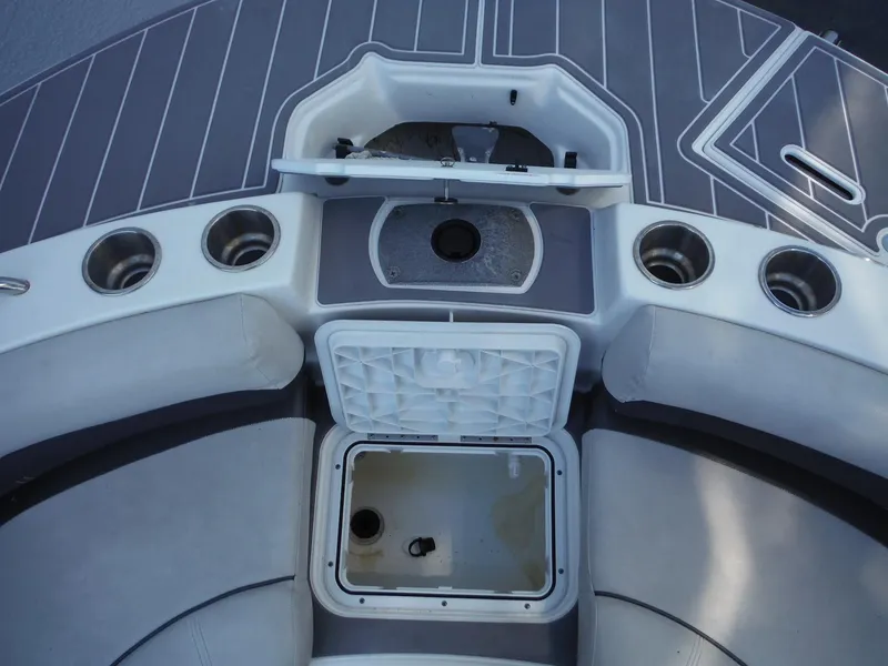 Slide: The Image of 2019 Hurricane Center Console 21 OB boat interior with seating and storage compartments. - 24