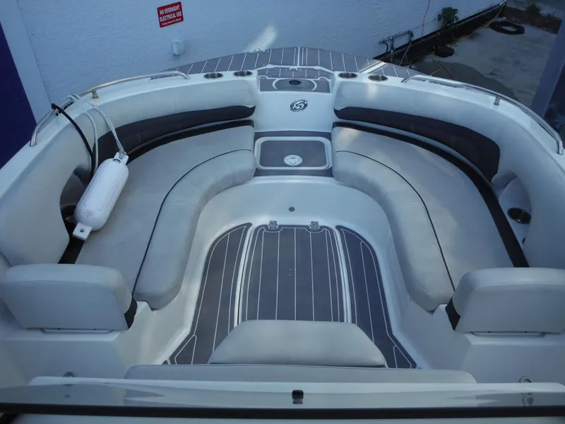 Slide: The Image of 2019 Hurricane Center Console 21 OB boat interior with cushioned seating and sleek design. - 9