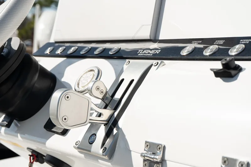 Slide: The Image of Control panel of 2025 Turner Boatworks 24 SAVAGE, featuring sleek design and modern controls. - 11