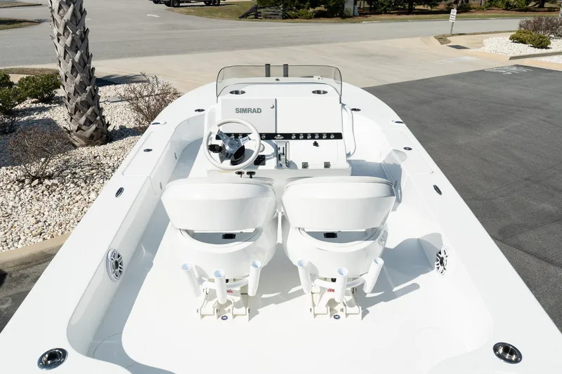 Slide: The Image of 2025 Turner Boatworks 24 SAVAGE with dual seats and modern dashboard. - 8
