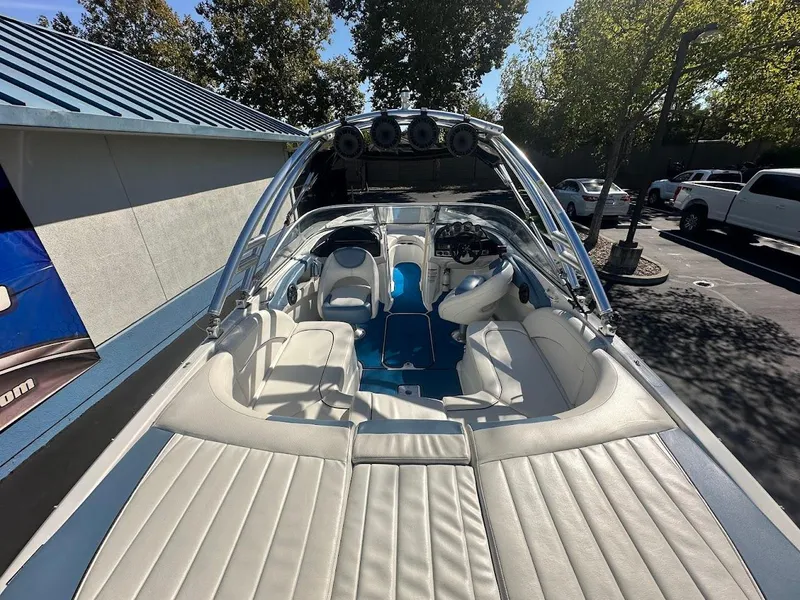 Slide: The Image of 2012 Bayliner 235 Bowrider boat with spacious seating and sleek design. - 12