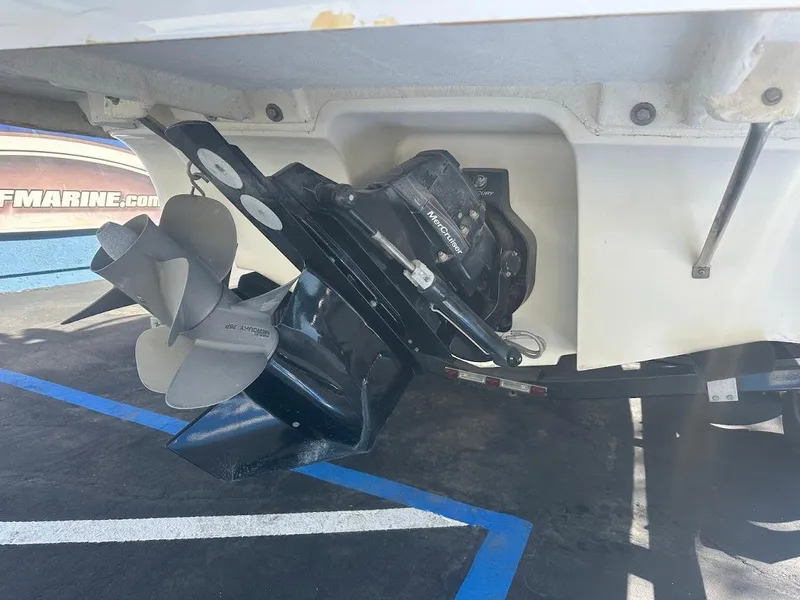 Slide: The Image of 2012 Bayliner 235 Bowrider boat propeller and stern drive detail. - 9