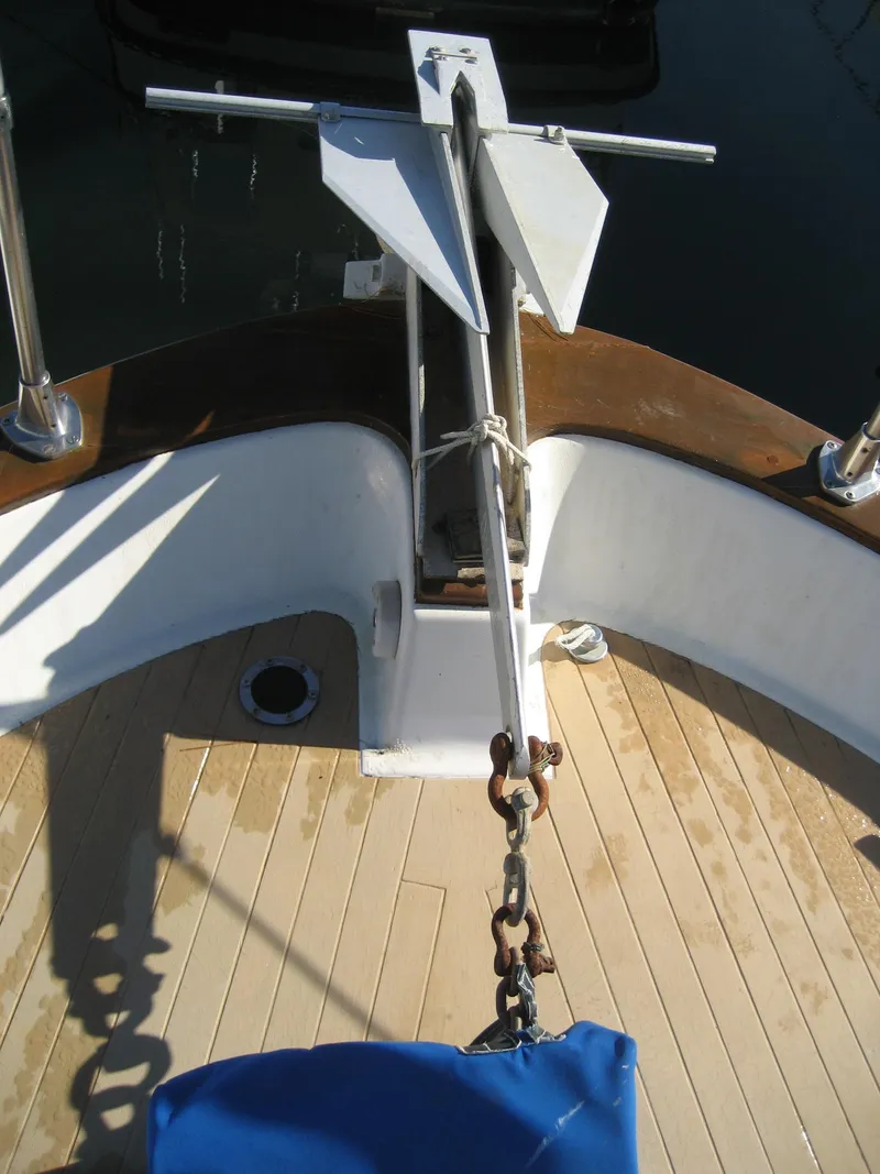 Slide: The Image of 1976 Tollycraft 48 Cockpit Motor Yacht anchor and deck view. - 4