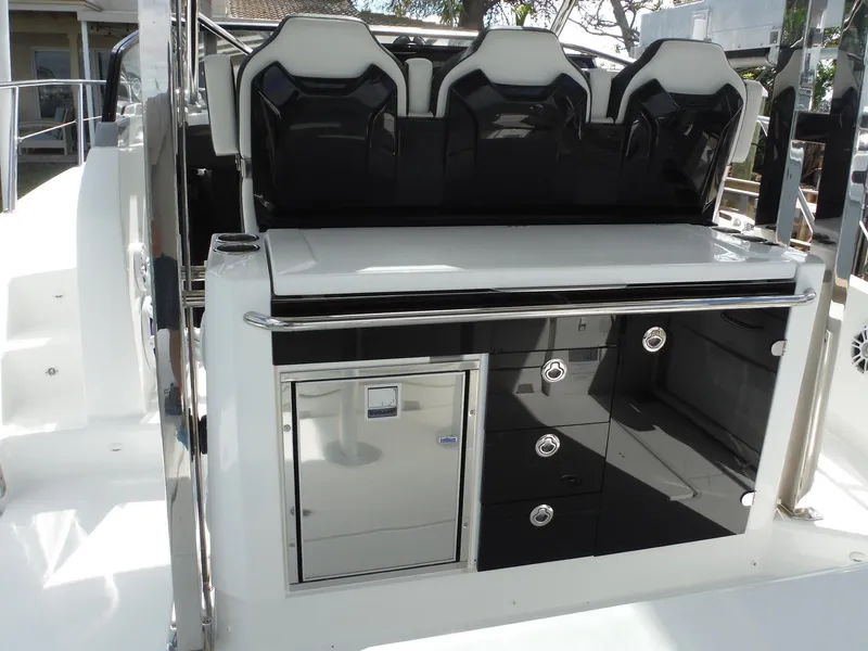 Slide: The Image of 2023 Jeanneau Leader 10.5 WA Series 2 boat interior with sleek seating and storage. - 19