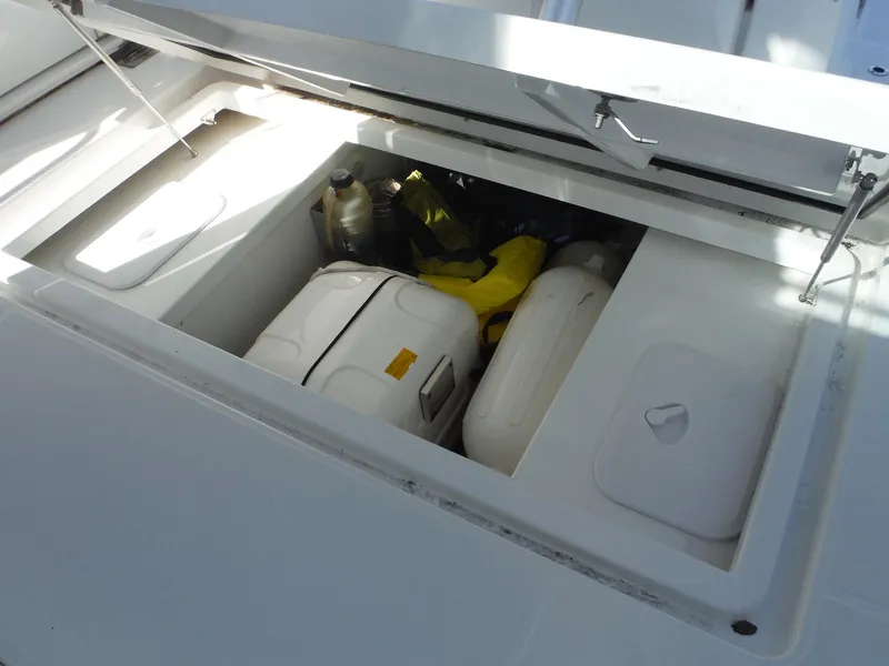 Slide: The Image of 2023 Jeanneau Leader 10.5 WA Series 2 storage compartment with equipment and supplies. - 45