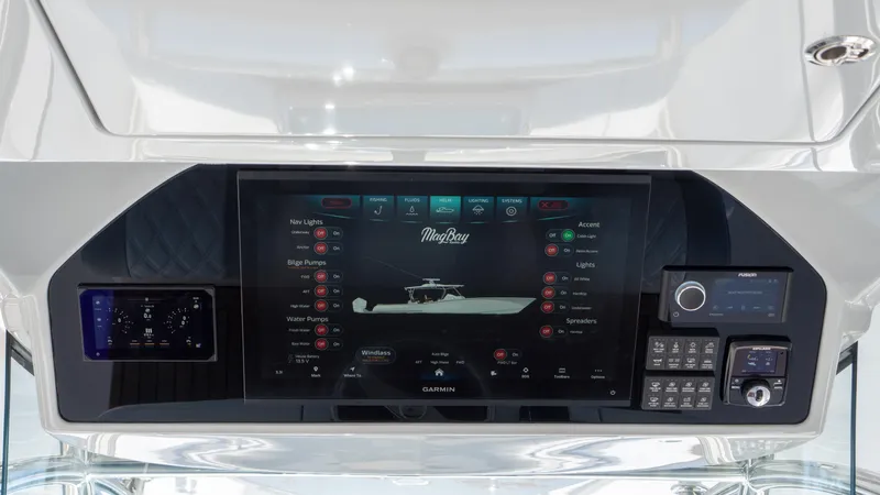 Slide: The Image of 2026 Mag Bay 43 CC dashboard with advanced navigation and control systems. - 17