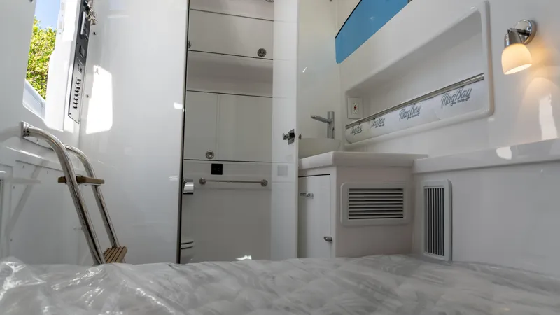 Slide: The Image of Interior of 2026 Mag Bay 43 CC boat, featuring modern design and amenities. - 9