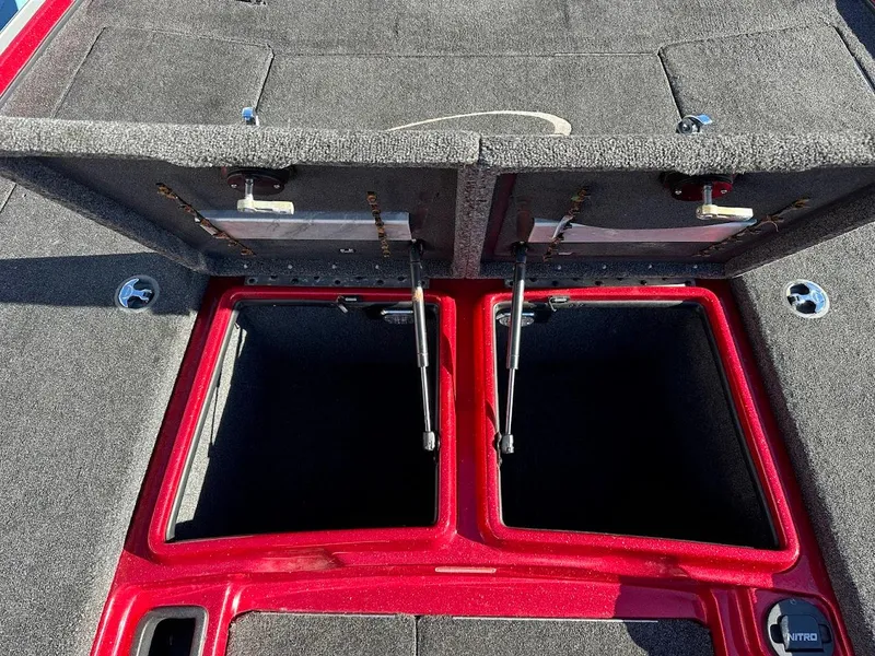 Slide: The Image of Open storage compartments on a 2008 Nitro Z9 boat deck. - 29