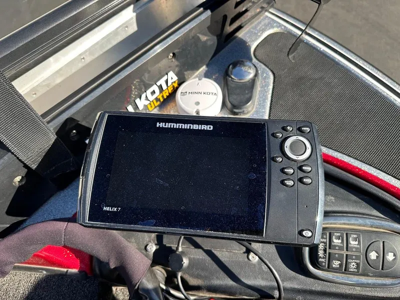 Slide: The Image of Humminbird Helix 7 fish finder on a 2008 Nitro Z9 boat dashboard. - 39