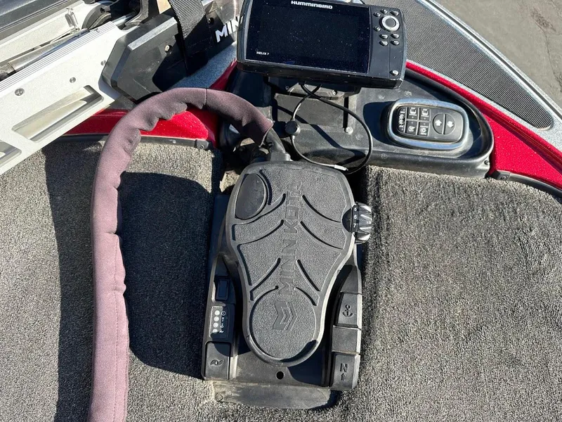 Slide: The Image of Nitro Z9 2008 boat control panel with foot pedal and electronic display. - 40