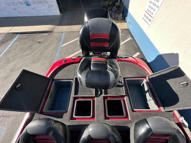 Slide: The Image of 2008 Nitro Z9 boat interior with storage compartments and seating. - 44