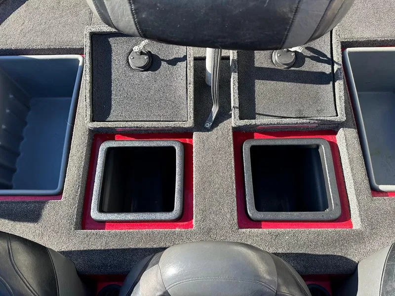 Slide: The Image of Interior of a 2008 Nitro Z9 boat showing storage compartments and seating. - 46