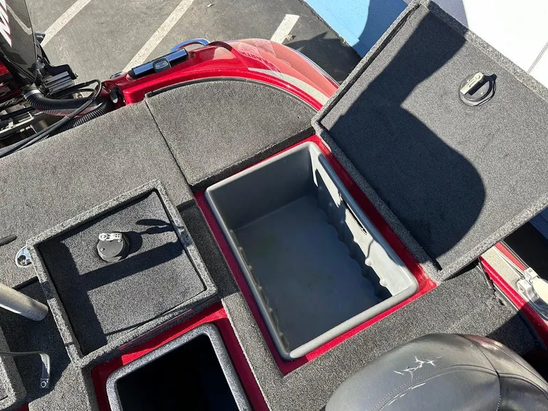 Slide: The Image of 2008 Nitro Z9 boat storage compartments with open lids, showcasing interior space. - 47