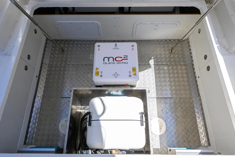 Slide: The Image of Engine compartment of 2024 Nimbus C11 featuring MC2 Quick Gyro stabilizer. - 2