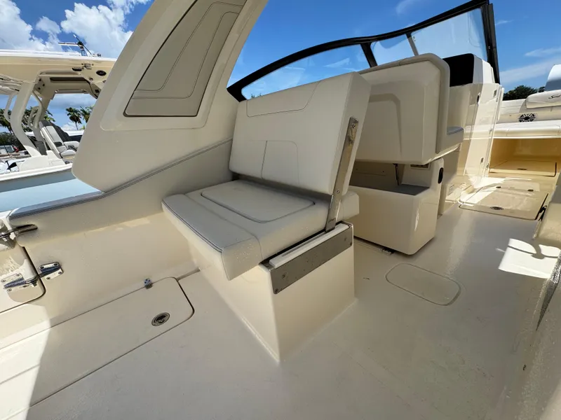 Slide: The Image of 2025 Scout 277 Dorado boat interior with sleek seating and modern design. - 15