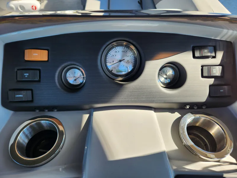 Slide: The Image of Dashboard of 2021 Bennington SX 21 L-Bench boat with gauges and controls. - 16