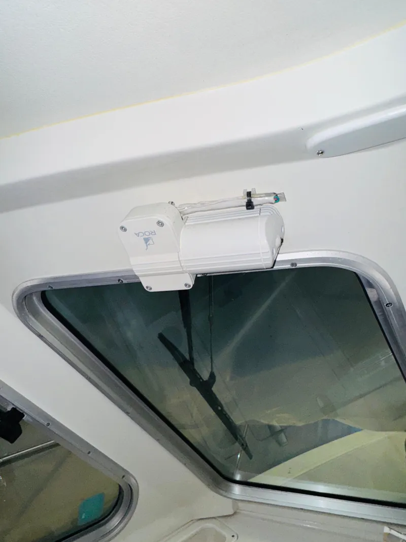 Slide: The Image of 2006 Back Cove Hardtop Express interior window and wiper detail. - 21