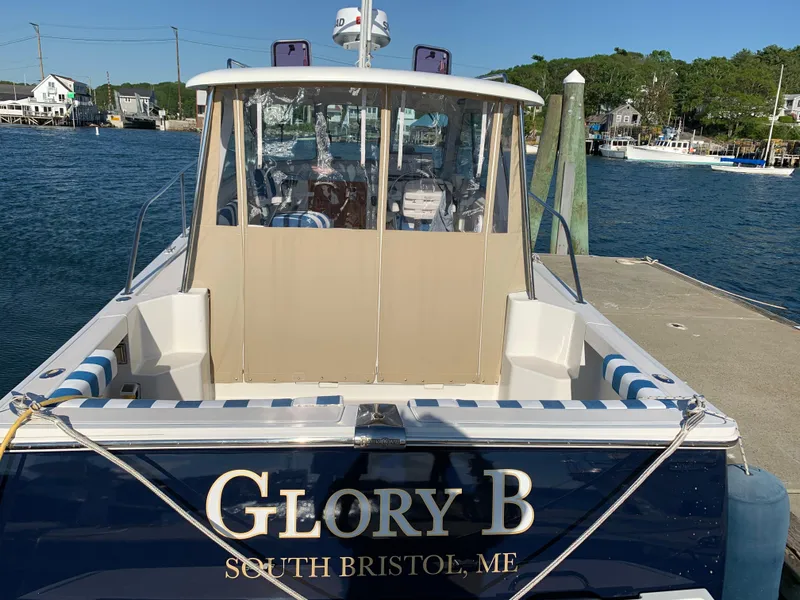 Slide: The Image of 2006 Back Cove Hardtop Express boat named "Glory B" docked in South Bristol, ME. - 25