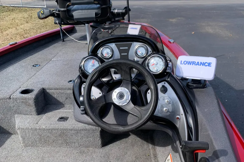 Slide: The Image of 2021 Tracker 175 TXW Tournament Edition boat dashboard with steering wheel and Lowrance electronics. - 5