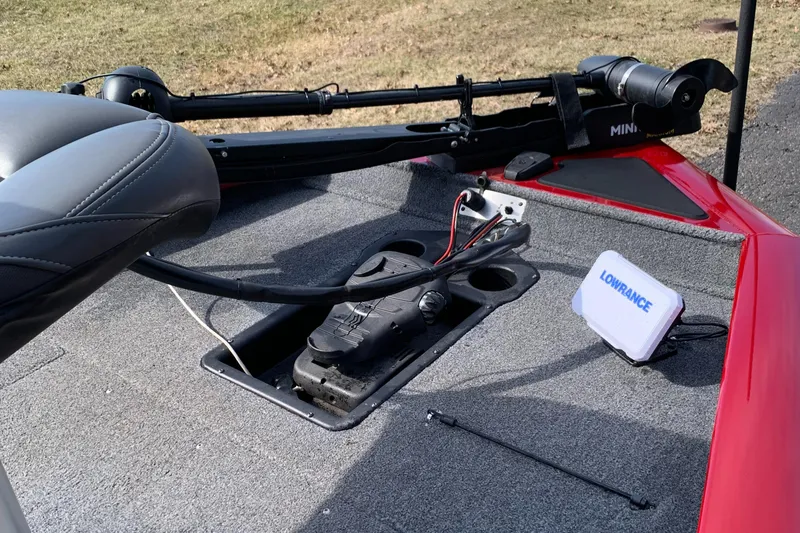 Slide: The Image of 2021 Tracker 175 TXW Tournament Edition boat deck with fishing equipment and Lowrance device. - 6