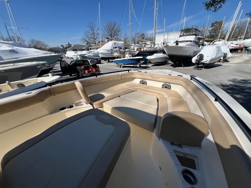 Slide: The Image of 2025 Scout 260 LXF boat interior at marina with other boats. - 27