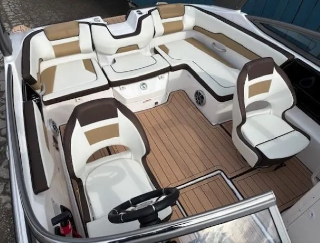 Slide: The Image of 2021 Yamaha Boats 195S interior with stylish seating and modern design. - 15