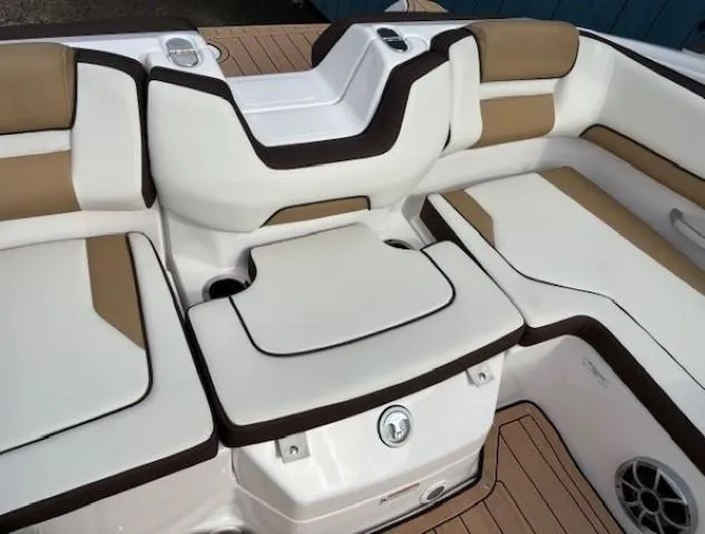 Slide: The Image of 2021 Yamaha Boats 195S interior seating with white and tan upholstery. - 27
