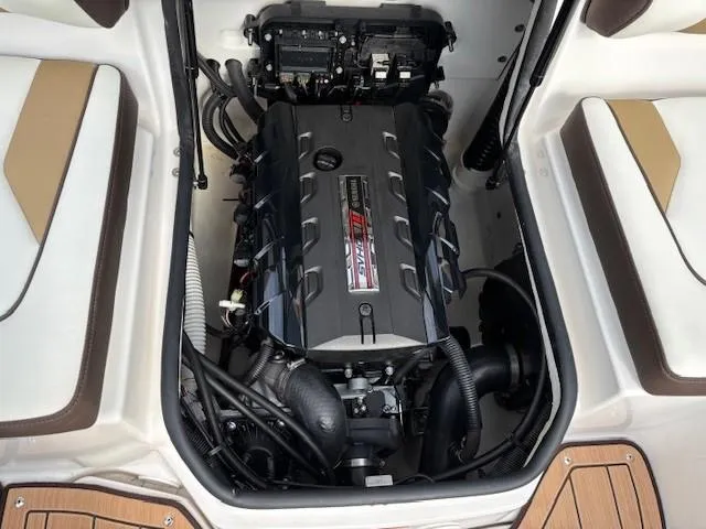 Slide: The Image of 2021 Yamaha Boats 195S engine compartment, showcasing powerful marine engine and components. - 29