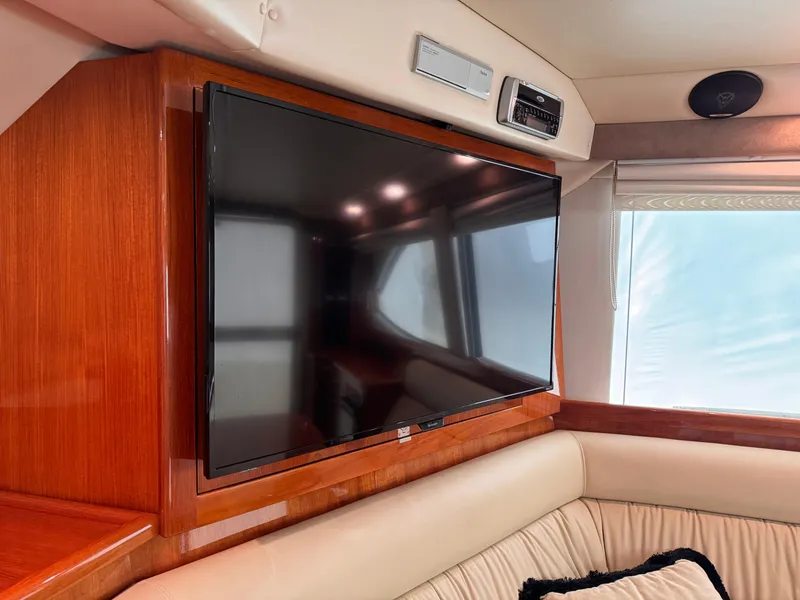 Slide: The Image of Flat-screen TV in 2005 Riviera 40 Flybridge yacht interior. - 11