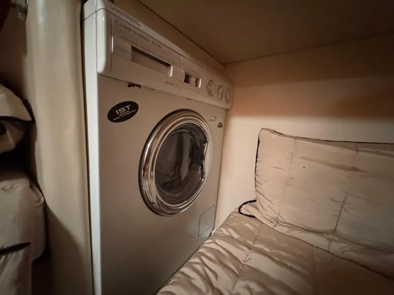 Slide: The Image of Washing machine inside 2005 Riviera 40 Flybridge yacht cabin. - 25
