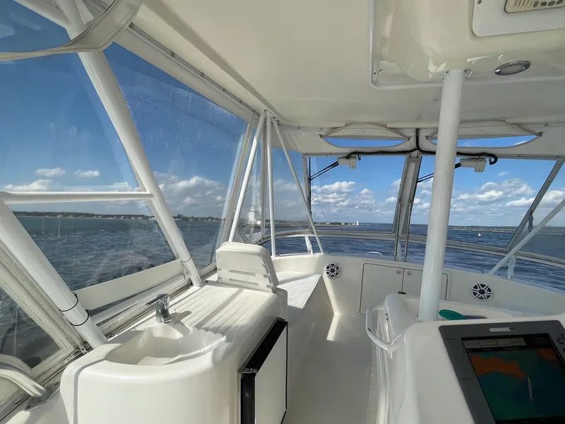 Slide: The Image of Interior view of 2005 Riviera 40 Flybridge yacht with ocean backdrop. - 30