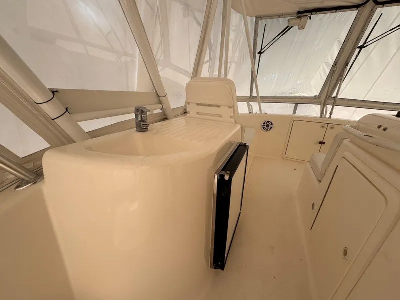 Slide: The Image of 2005 Riviera 40 Flybridge interior with seating and storage compartments. - 34