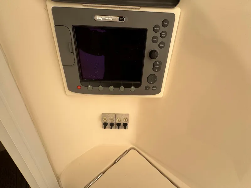 Slide: The Image of Control panel on 2005 Riviera 40 Flybridge boat interior. - 56