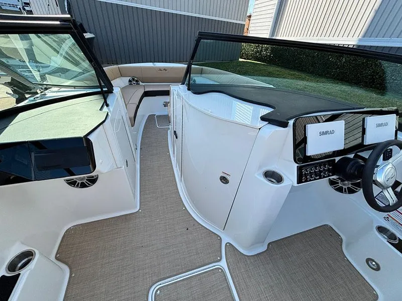 Slide: The Image of 2025 Sea Ray SDX 270 Outboard boat interior with modern dashboard and seating. - 15