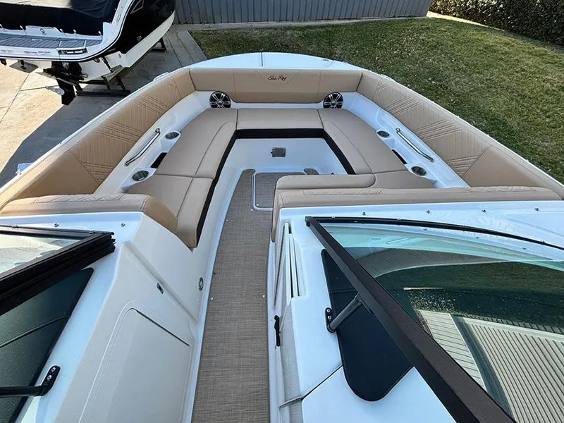 Slide: The Image of 2025 Sea Ray SDX 270 Outboard boat interior with spacious seating and modern design. - 17