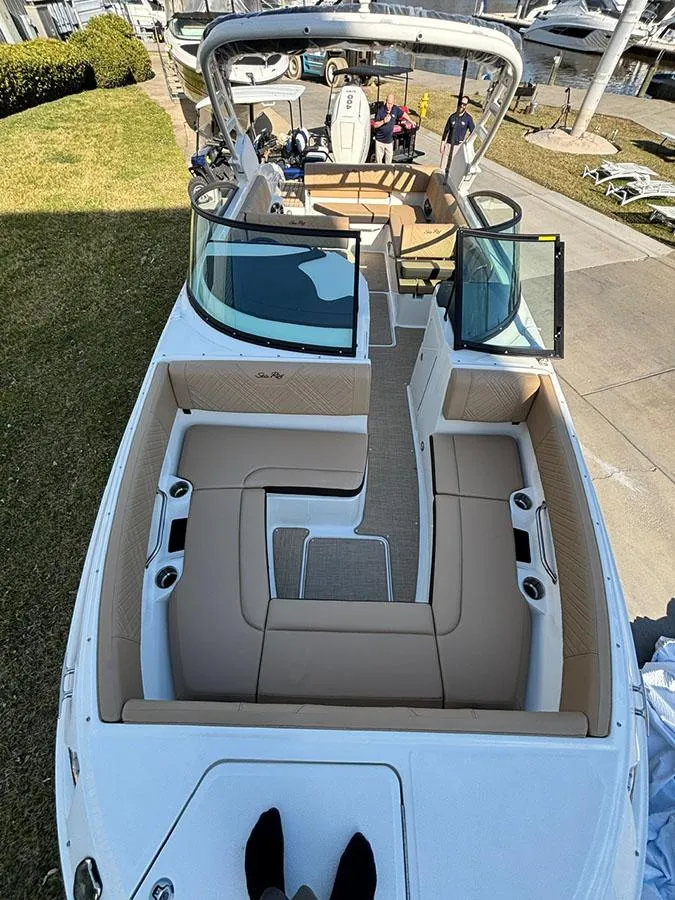 Slide: The Image of 2025 Sea Ray SDX 270 Outboard boat with spacious seating and modern design. - 21