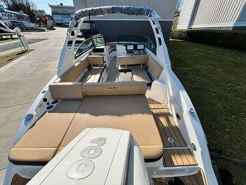 Slide: The Image of 2025 Sea Ray SDX 270 Outboard boat with spacious seating and powerful engine. - 22