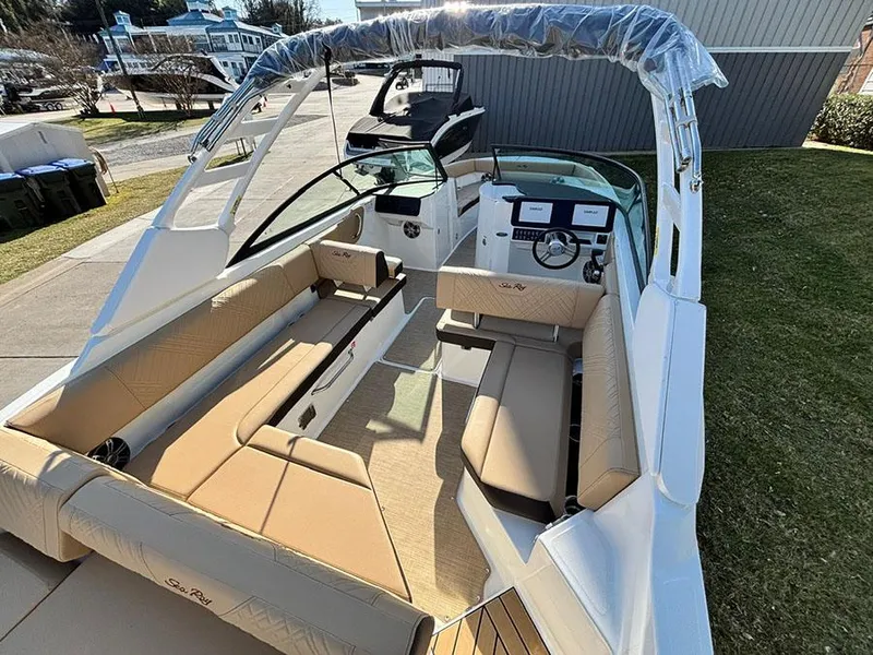 Slide: The Image of 2025 Sea Ray SDX 270 Outboard boat with spacious seating and modern design. - 4