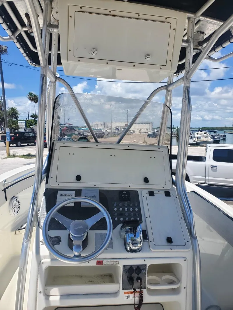 Slide: The Image of 2003 Hydra-Sports 2400 CC Vector boat console with steering wheel and controls. - 10
