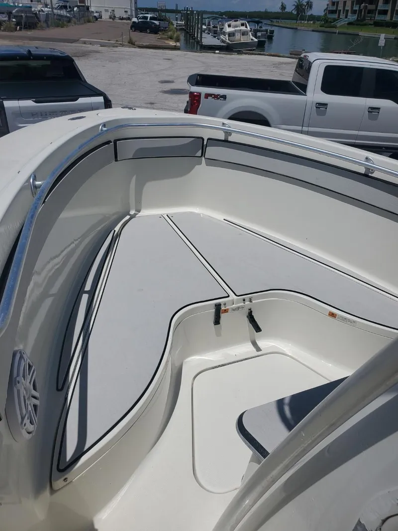 Slide: The Image of 2003 Hydra-Sports 2400 CC Vector boat interior, featuring spacious seating and sleek design. - 11