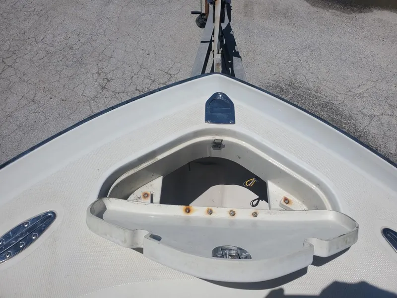 Slide: The Image of 2003 Hydra-Sports 2400 CC Vector boat bow with anchor storage compartment. - 14
