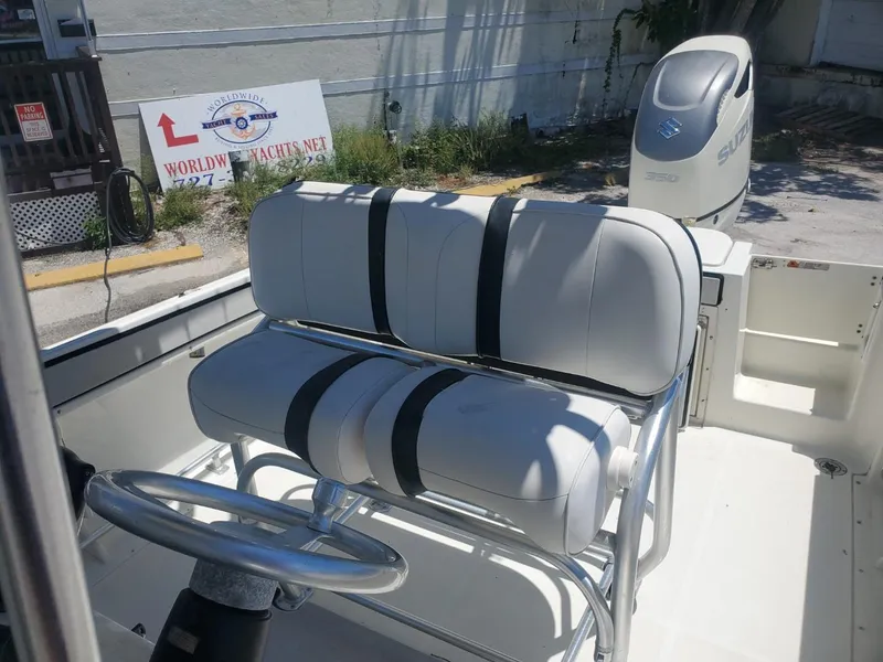 Slide: The Image of 2003 Hydra-Sports 2400 CC Vector boat interior with seating and steering wheel. - 19